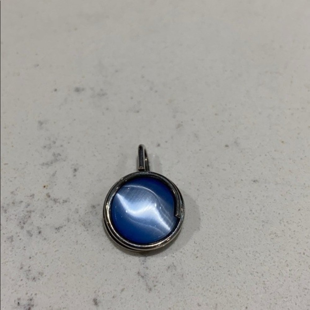 .925 stamped silver pendant with light blue stone